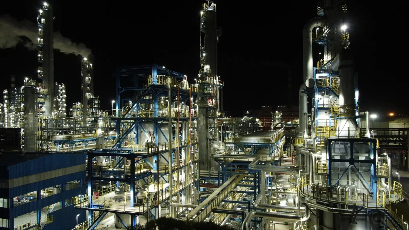 A chemical process plant — distillation columns and process piping