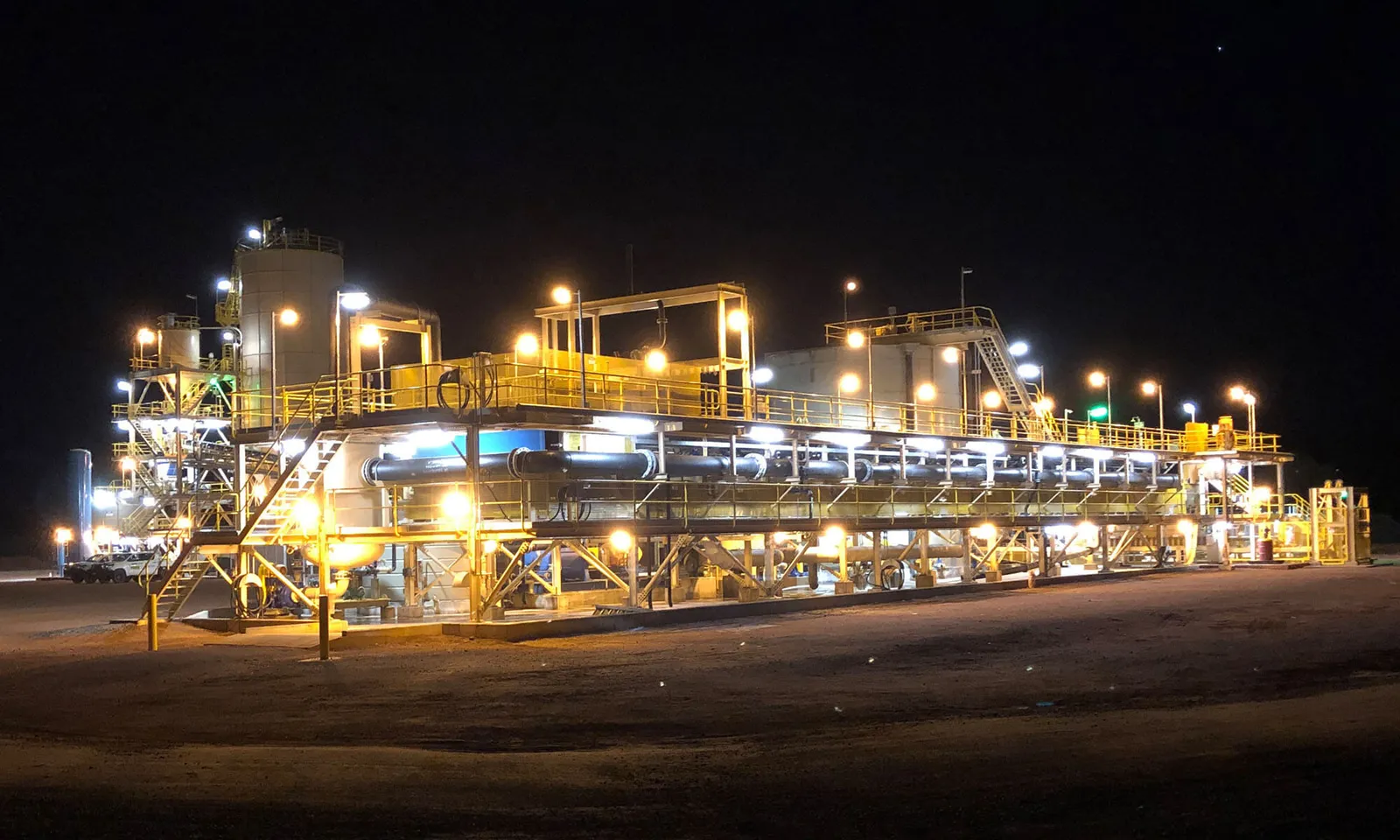 A mineral processing plant — grinding mills and flotation circuit